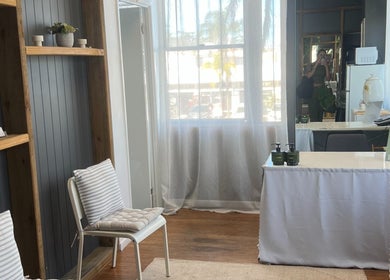 Cozy waiting area of IPL Aesthetics - Bundall with stylish decor in Bundall, Queensland, AU.