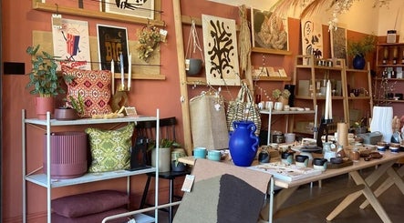 Cozy interior with decor and ceramics at Wardrobe Of Friends, Stockport, England, GB.
