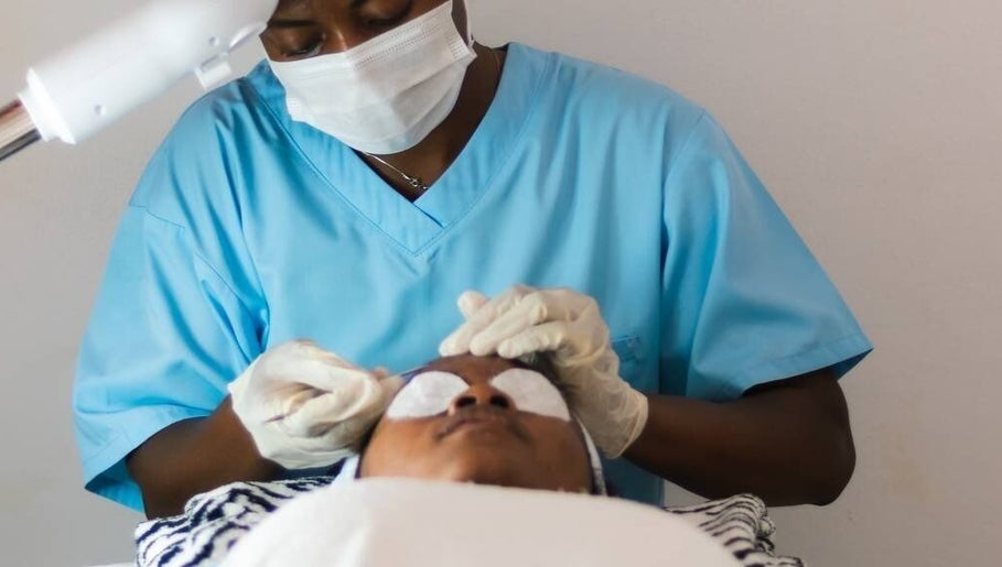 Therapist performing a relaxing facial at Sauna Hub Ghana, Madina, Greater Accra Region, GH.
