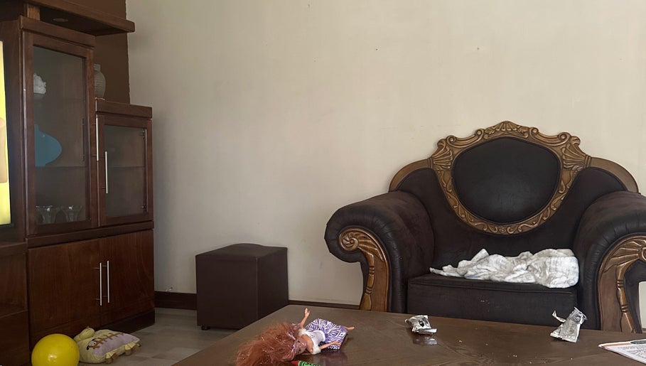 Elegant lounge chair at El Roi Nails, Vereeniging, Gauteng, ZA, perfect for relaxation in a chic setting.