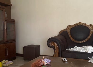 Elegant lounge chair at El Roi Nails, Vereeniging, Gauteng, ZA, perfect for relaxation in a chic setting.