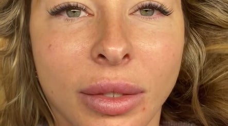 Close-up of a serene face showcasing glowing skin at Byjords, Salford, England, GB.