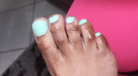 Mint green pedicure on toes at Lee's Beauty, Cape Town, Western Cape, ZA. Vibrant wellness care.