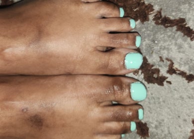 Bright mint pedicure from Lee's Beauty in Cape Town, Western Cape, ZA, showcasing professional nail care.