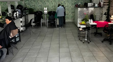 Modern interior of Shecky hair and beauty in Cape Town, Western Cape, ZA showcasing elegant salon chairs and decor.