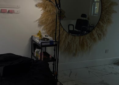 Modern beauty room at Noora's Beauty Lab, Edinburgh, Scotland, GB with plush decor and professional equipment.
