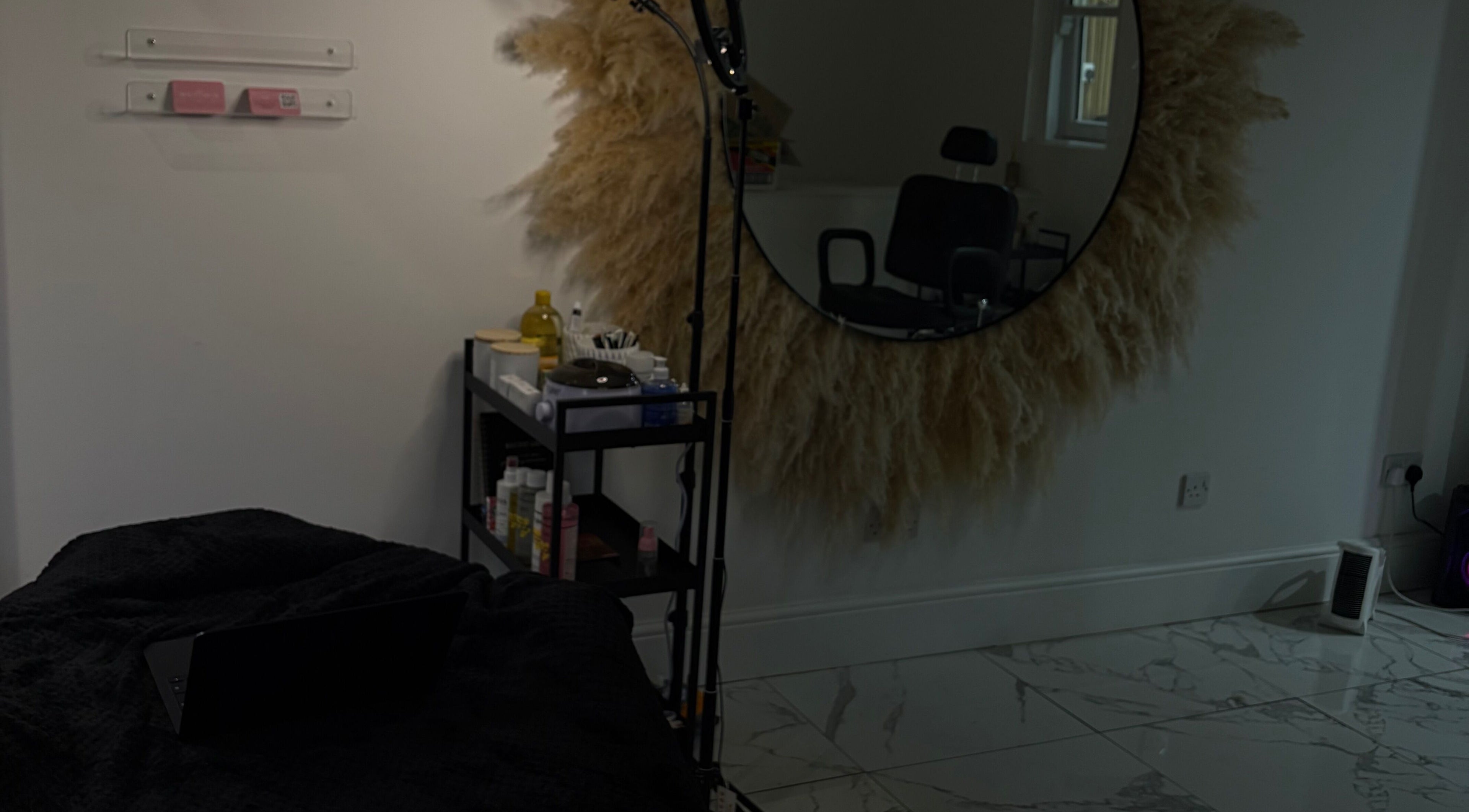 Modern beauty room at Noora's Beauty Lab, Edinburgh, Scotland, GB with plush decor and professional equipment.