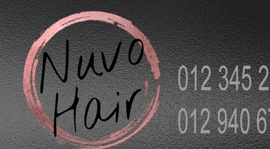 Nuvo Hair logo with contact details in Pretoria, Gauteng, ZA, showcasing elegance and style.