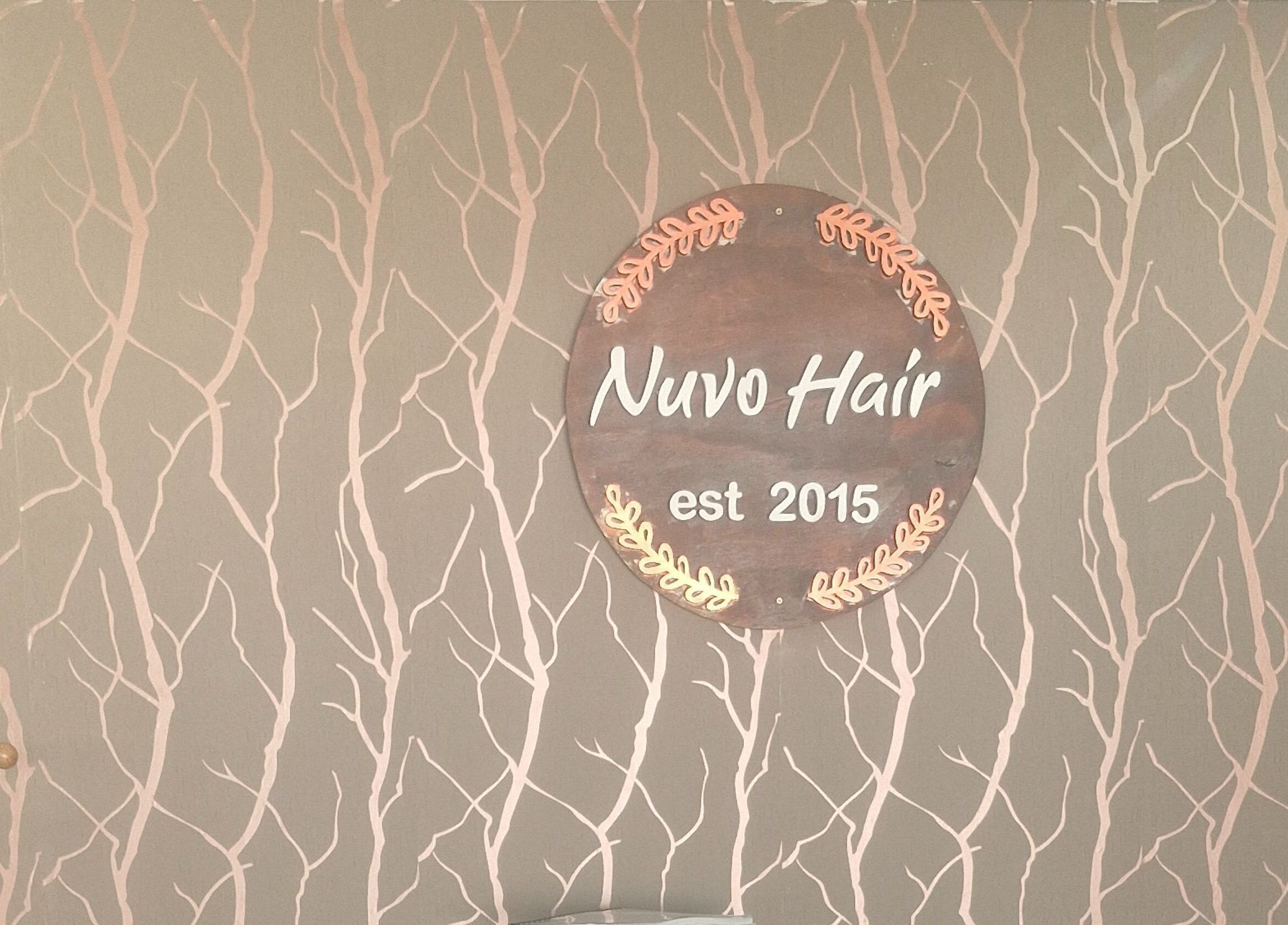 Nuvo Hair sign on elegant wall at Pretoria, Gauteng, ZA beauty venue.