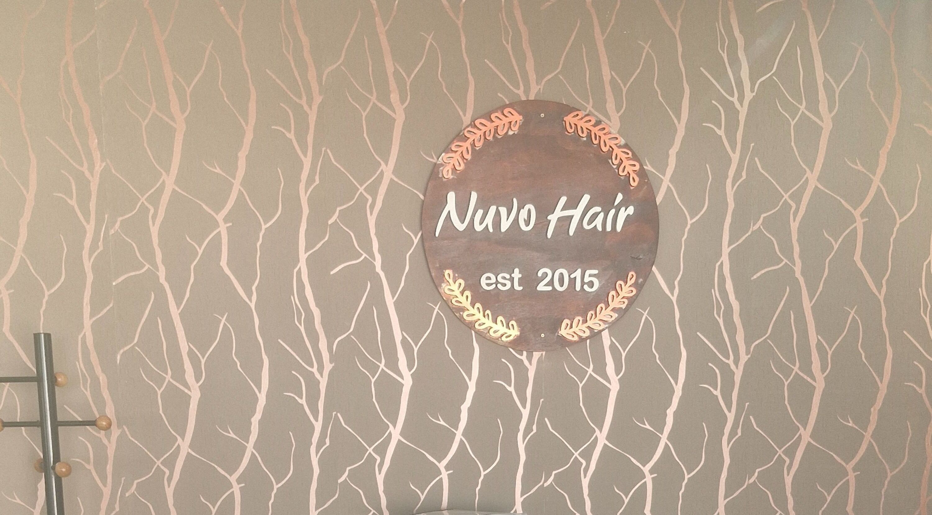 Nuvo Hair sign on elegant wall at Pretoria, Gauteng, ZA beauty venue.