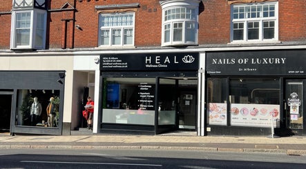 Exterior view of AtelieRx Medical Aesthetics in St Albans, England, showcasing chic storefront design.