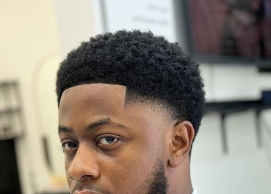 Fresh fade hairstyle at Le Brand 254, Nairobi, Nairobi County, KE, showcasing expert barbering skills.