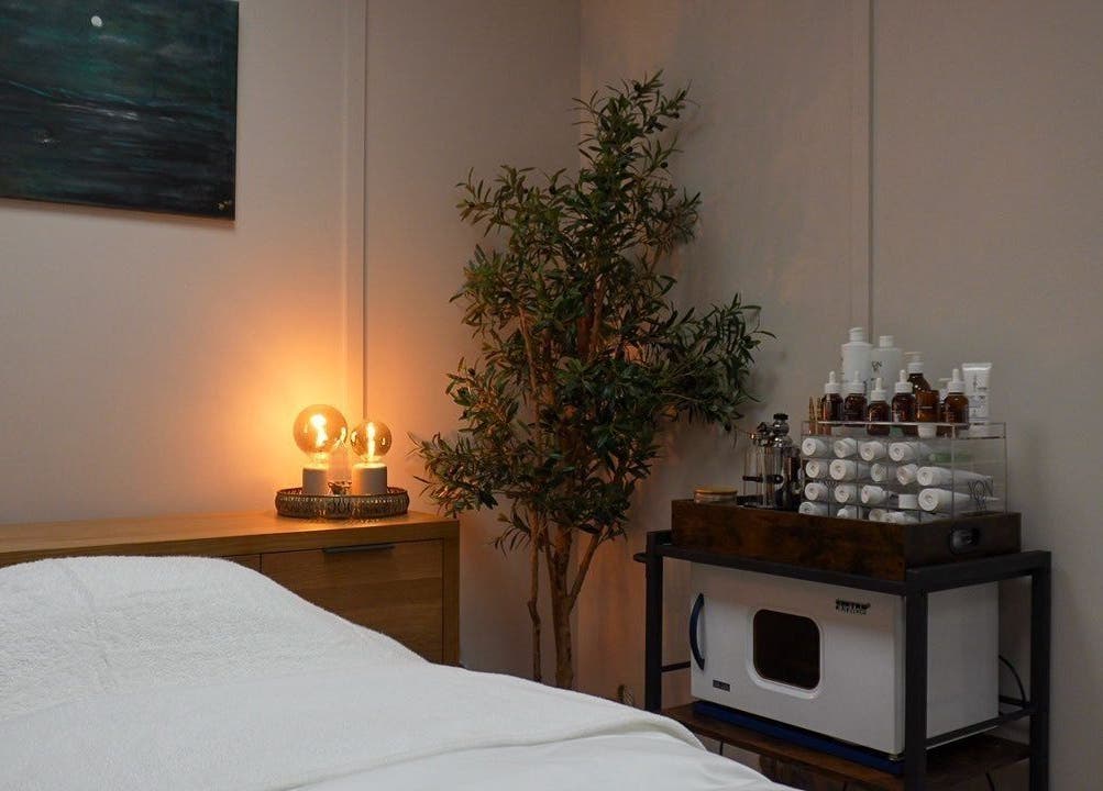 Cozy treatment room at Tranquil Beauty By Teresa, Castlewellan, Northern Ireland, GB with ambient lighting.