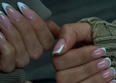 Stylish French manicure at MELGANAILS, دبي, دبي, AE, showcasing glossy, expertly done nails.