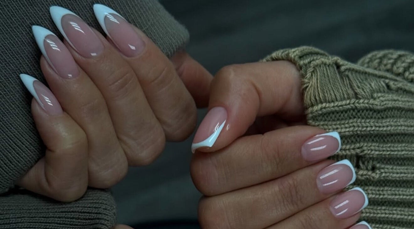 Stylish French manicure at MELGANAILS, دبي, دبي, AE, showcasing glossy, expertly done nails.