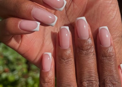 Beautiful French manicure at MELGANAILS, دبي, دبي, AE, showcasing glossy, perfectly shaped nails.