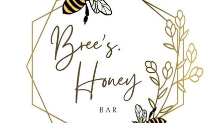 Artistic logo with bees and floral design for Bree's Honey Bar CW in Willemstad, Curaçao, CW.