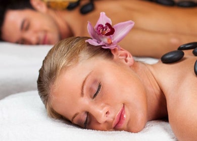 Couple enjoying hot stone therapy at Great Life Oriental Therapy Massage in Macomb, Michigan, US.
