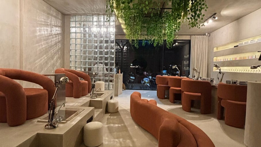 Elegant interior of Mier Nails Salon, Bali featuring stylish seating and decor.