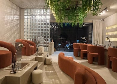 Elegant interior of Mier Nails Salon, Bali featuring stylish seating and decor.