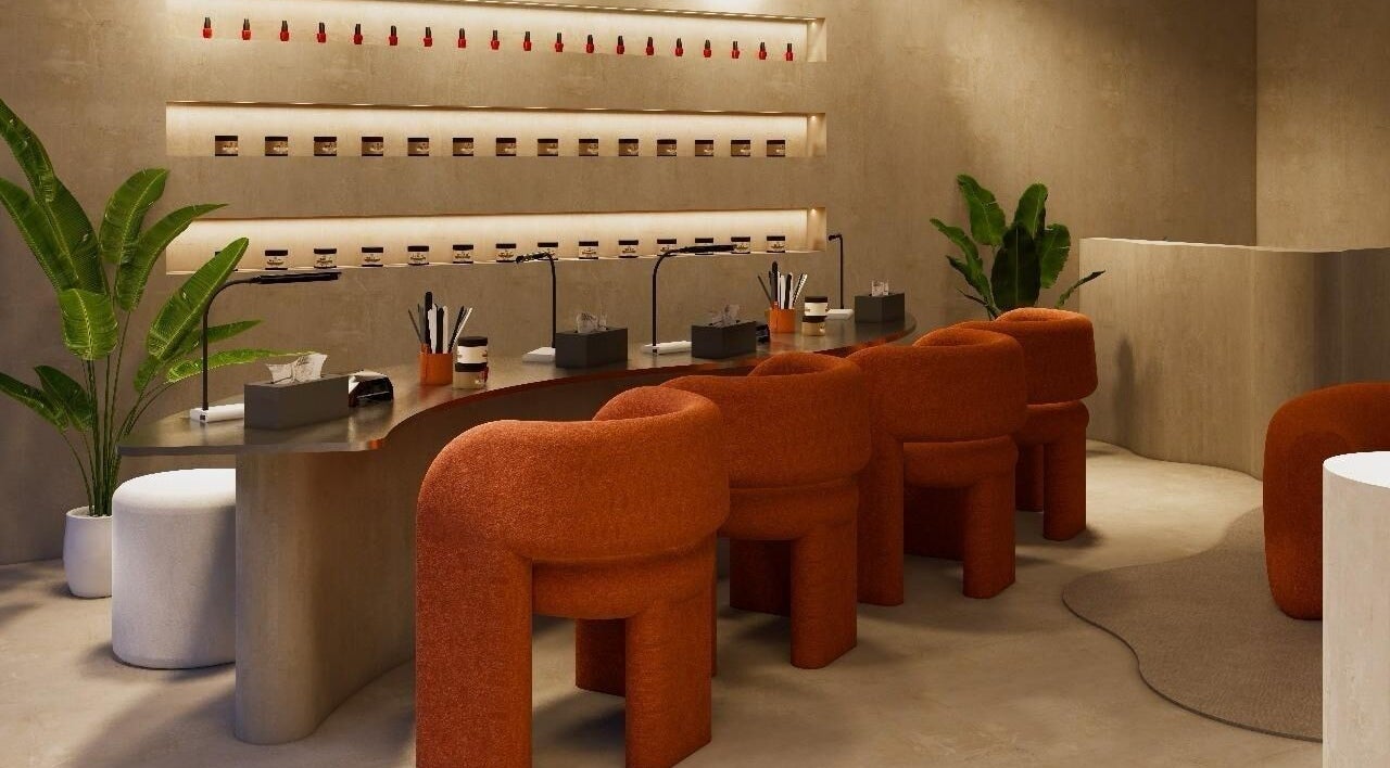 Stylish interior of Mier Nails Salon in Bali, Bali, ID with modern decor and vibrant chairs.