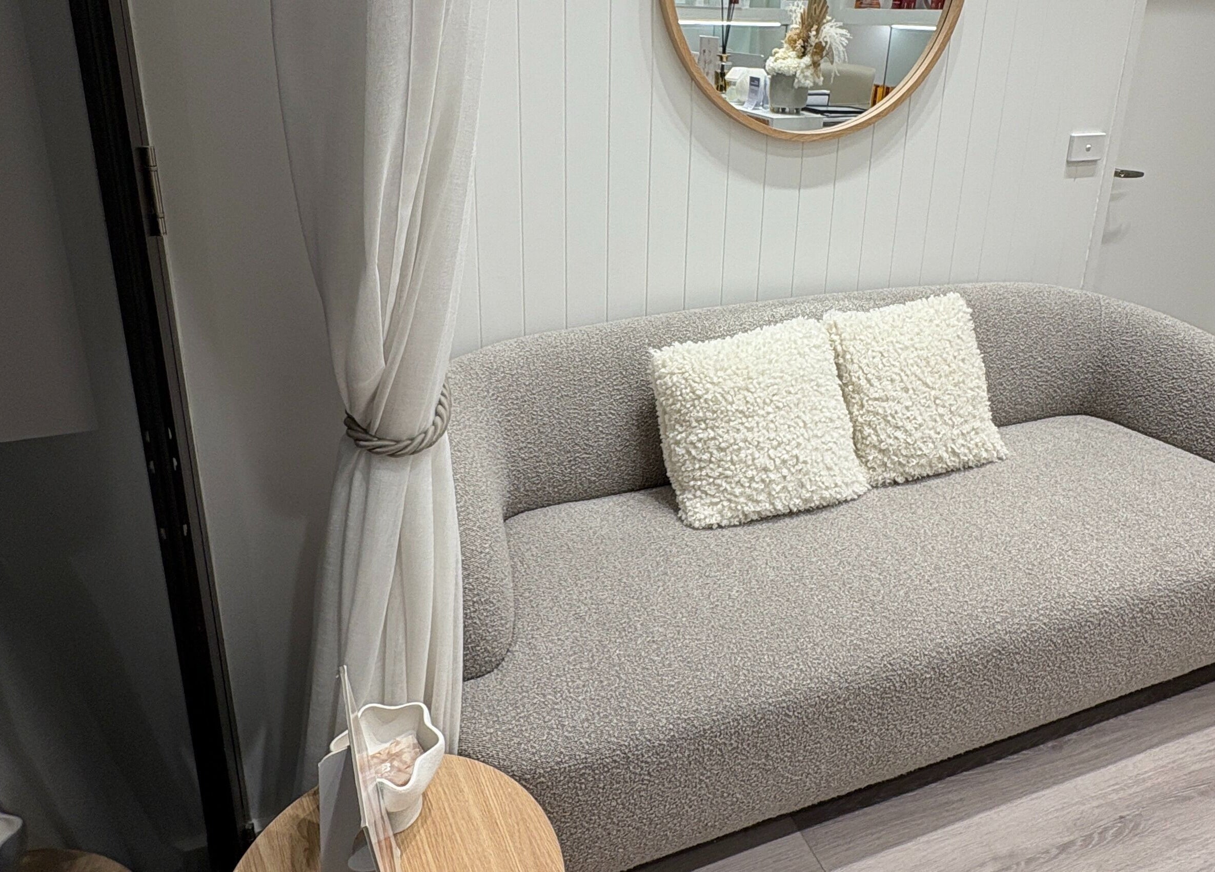 Elegant lounge area at Keenest Studio, Melbourne, Victoria, AU, featuring plush seating and stylish decor.