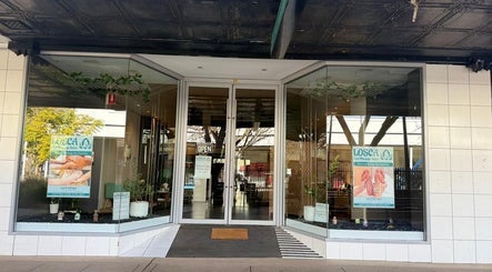 Entrance of Losca Body & Foot Massage in Shepparton, Victoria, AU with vibrant display and open signage.