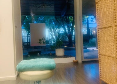 Cozy massage room at Losca Body & Foot Massage, Shepparton, Victoria, AU, offering relaxation with a garden view.