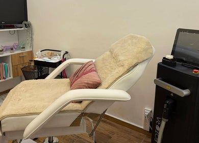 Relaxing treatment area at 8th Sense Beauty Salon, Varna, Varna, BG with plush chair and modern equipment.