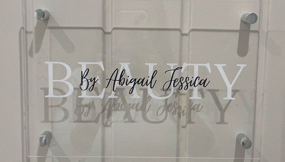 Sign for Beauty by Abigail Jessica in Chesterfield, England, GB, elegantly displayed on a glass panel.