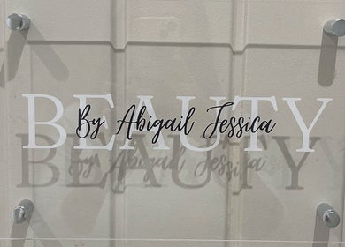 Sign for Beauty by Abigail Jessica in Chesterfield, England, GB, elegantly displayed on a glass panel.