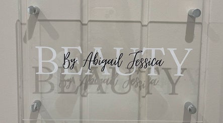 Sign for Beauty by Abigail Jessica in Chesterfield, England, GB, elegantly displayed on a glass panel.