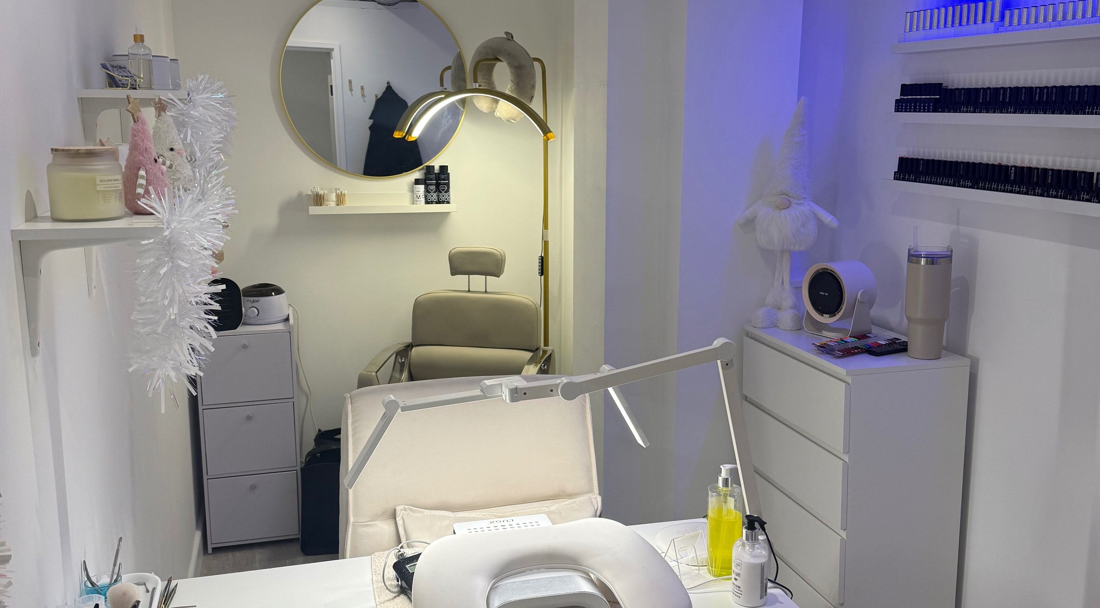 Elegant interior of Beauty by Abigail Jessica, Chesterfield, England, showcasing a stylish treatment room setup.