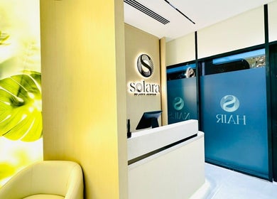 Reception area of Solara Beauty Salon in Dubai, Dubai, AE with elegant decor and welcoming ambiance.