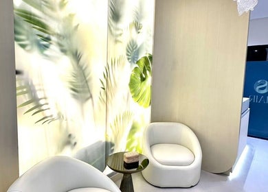 Relaxing waiting area at Solara Beauty Salon, Dubai, Dubai, AE, featuring stylish chairs and vibrant decor.