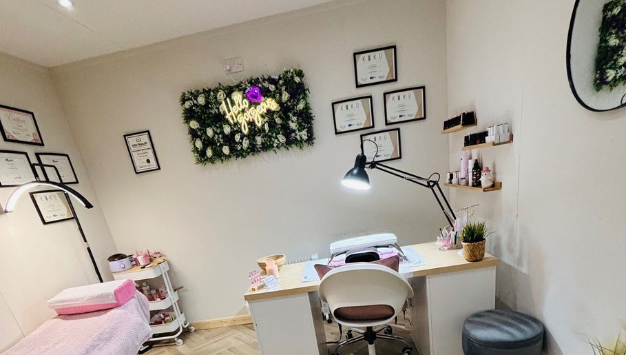 The beauty treatment room at The Country Beauty Barn, Castlederg, Northern Ireland, GB, with decor and tools.