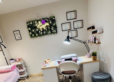 The beauty treatment room at The Country Beauty Barn, Castlederg, Northern Ireland, GB, with decor and tools.