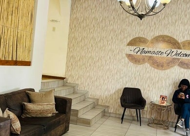 Inviting seating area of Meraki Wellness Centre Olof Palme, Windhoek, Khomas Region, NA with a warm welcome sign.