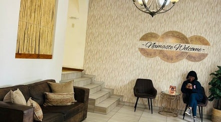 Inviting seating area of Meraki Wellness Centre Olof Palme, Windhoek, Khomas Region, NA with a warm welcome sign.