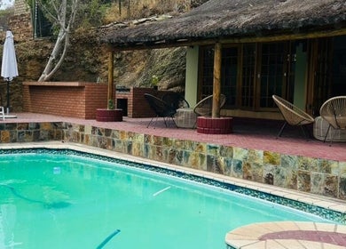 Relax by the serene pool at Meraki Wellness Centre Olof Palme, Windhoek, Khomas Region, NA.
