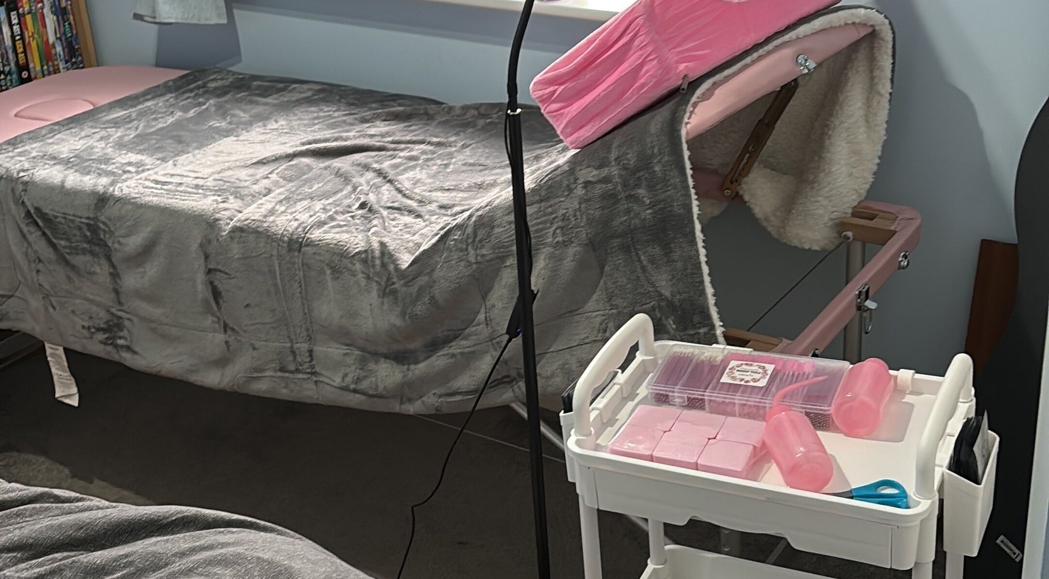Luxurious lash room setup at Live Love Lash, Bicester, England, GB, featuring a cozy treatment bed and tools.