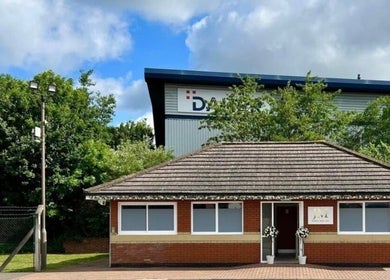 Haus of whites venue in Hilton, England, GB with lush greenery and a welcoming entrance.