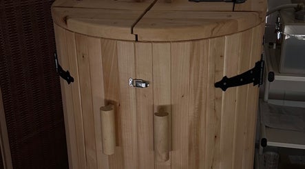 Wooden sauna barrel at Beauty House SPA in County Galway, Galway, IE for rejuvenating wellness treatments.