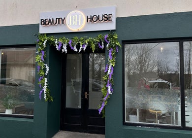 Entrance of Beauty House SPA adorned with floral decor in County Galway, Galway, IE.
