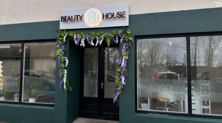 Entrance of Beauty House SPA adorned with floral decor in County Galway, Galway, IE.