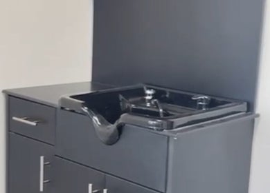 Modern wash station at Skyl Aesthetic Miami, North Miami Beach, Florida, US, featuring sleek cabinetry.