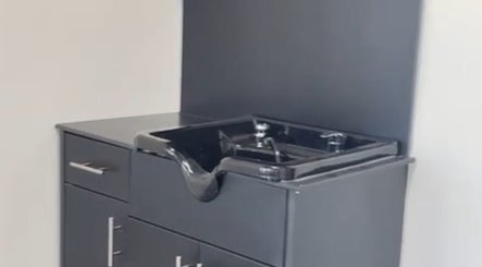 Modern wash station at Skyl Aesthetic Miami, North Miami Beach, Florida, US, featuring sleek cabinetry.