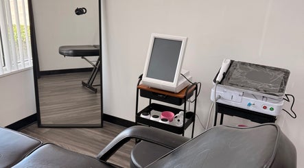 Skyl Aesthetic Miami treatment room with modern decor in North Miami Beach, Florida, US.