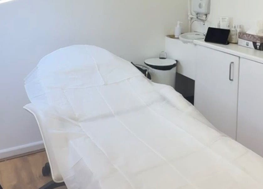 Treatment room at Katerina Aesthetics, Sidcup, England, GB with a clean aesthetic and modern equipment.