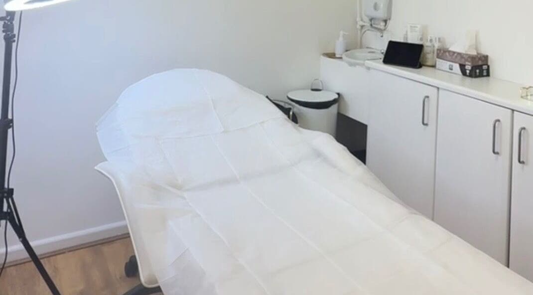 Treatment room at Katerina Aesthetics, Sidcup, England, GB with a clean aesthetic and modern equipment.